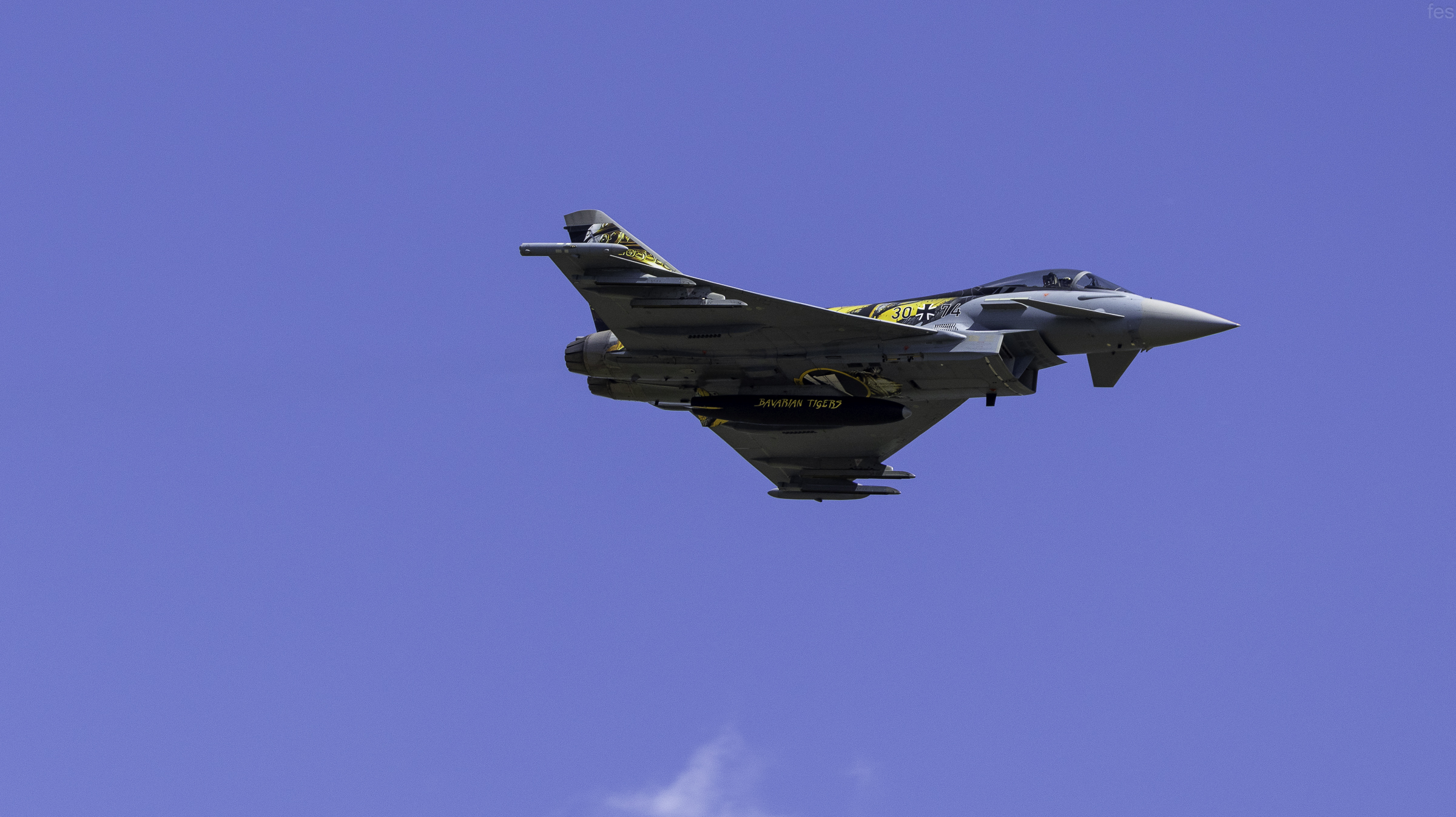 'Ghost Tiger' Typhoon passing overhead with the 'Bavarian Tigers' fuel tank visible